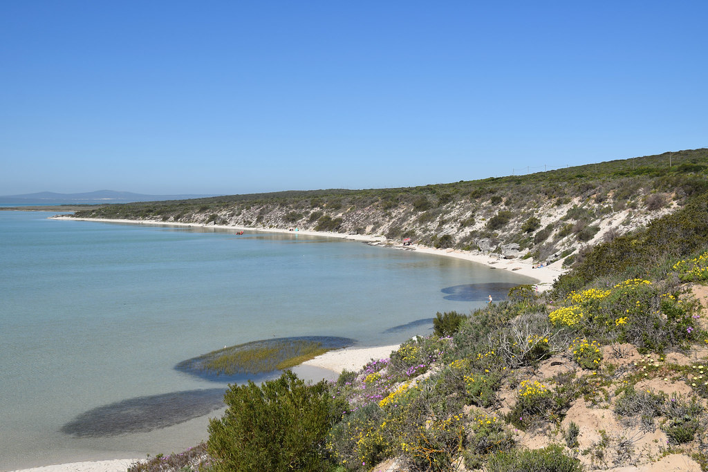 Clear lagoon water and pale sand at Kraalbaai.